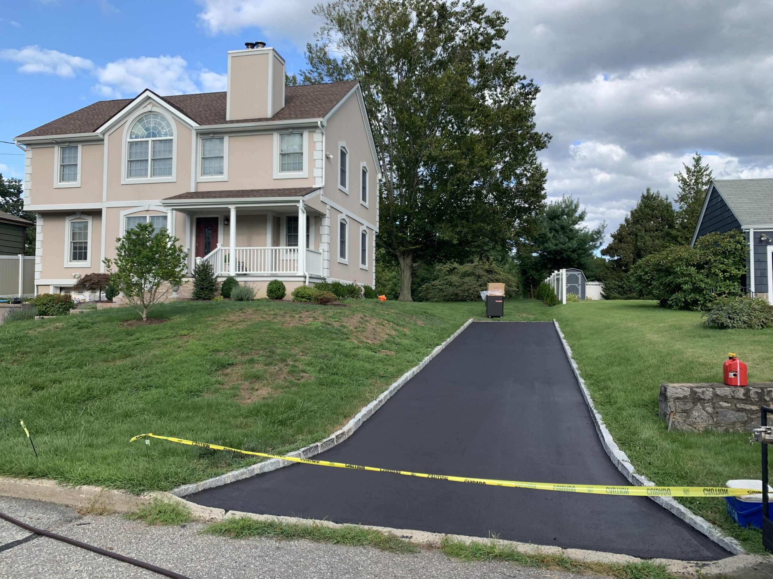 Newly sealed asphalt driveway